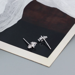 Detail shot of S925 sterling silver stamp and sparkling double cubic zirconia studs