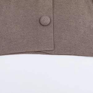 Minimalist taupe knit cardigan featuring premium fabric-covered buttons and fine texture