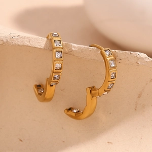 Macro shot of 18K gold plated stainless steel C-hoops with cubic zirconia stones
