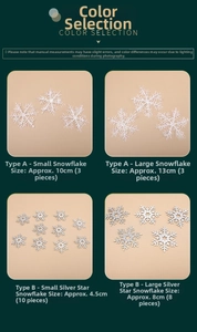 Selection of white glitter snowflake ornaments in four different sizes for Christmas decoration