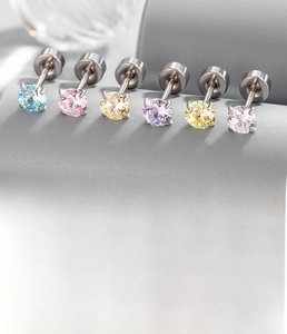 Detailed view of six colorful 4mm cubic zirconia stud earrings with flat back design
