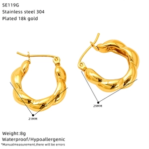 Detail view of 18k gold plated twisted hoop earrings with 21mm x 29mm dimensions