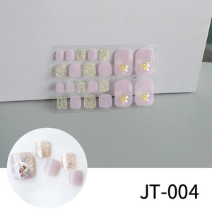 Detail of pink and purple 3D toe nail stickers with gold foil and glitter patterns