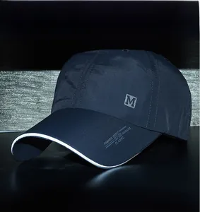 Detail of baseball cap with reflective edge design and fashion sport embroidery