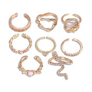 8-piece set of gold-finish geometric heart rings with pink stones and pearls