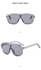 Detail of grey oversized sunglasses with fashion T-hinge from front and side views
