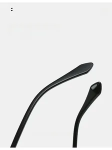 Detail of curved black temple tips on geometric sunglasses for enhanced comfort