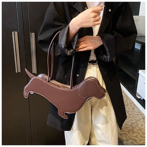 Detail of creative dark brown dachshund-shaped tote bag in glossy PU leather material