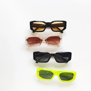 Multi-color collection of chunky rectangular sunglasses in black, amber, pink, and green