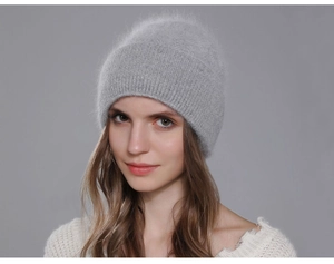Close-up of fluffy grey Angora rabbit hair knit beanie showing soft wool texture