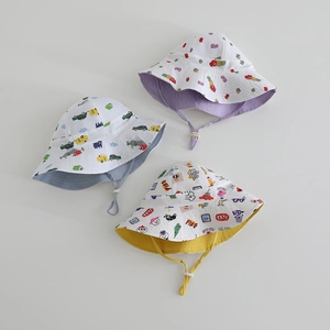 Three children's reversible bucket hats with cartoon prints and adjustable windproof ropes