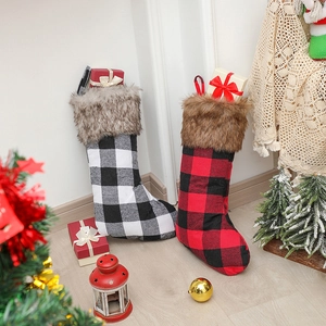 Set of large buffalo plaid Christmas stockings in red and black with faux fur trim