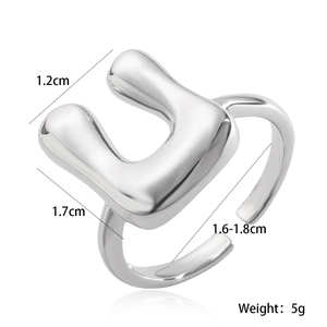 Detailed view of silver fluid metal open ring with size specs 1.2cm height and 5g weight