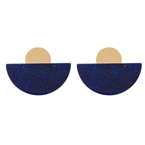 Minimalist geometric earrings with golden studs and navy blue star-patterned pendants