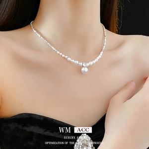 Elegant zircon pearl necklace with silver chain on model, luxury fashion style for women