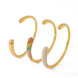 Three-piece set of 18K gold-plated bangles with colorful rhinestones and white pearls