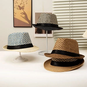 Classic summer fedora straw hats with geometric weave patterns and black ribbon bands
