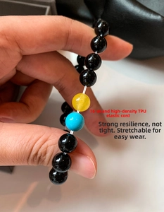 Detail showing 16-strand TPU elastic cord durability and high elasticity of the beaded bracelet