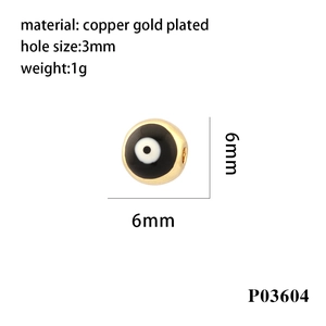 Macro shot of 6mm evil eye bead with copper gold plating and 3mm hole size details