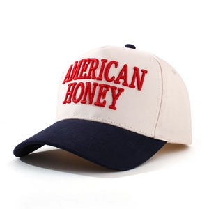 Close-up of American Honey embroidery on two-tone cotton baseball cap with fine stitching