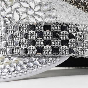 Close-up of sparkling silver sequins and marquis cut rhinestones on a punk performance hat