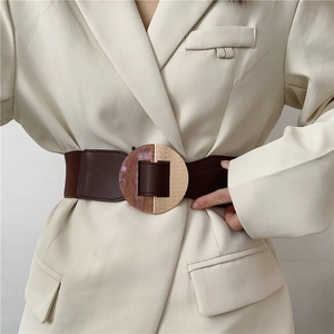 Vintage elastic wide belt for dresses featuring dark brown leather and round buckle