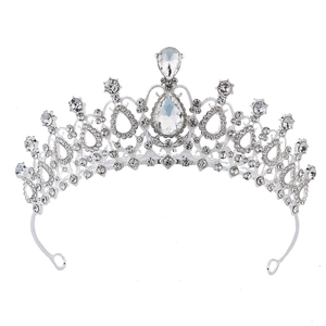 Close-up of bridal crown with silver finish and large teardrop-shaped crystal centerpiece