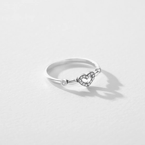 S925 sterling silver hollow heart ring with sparkling zirconia in a minimalist style