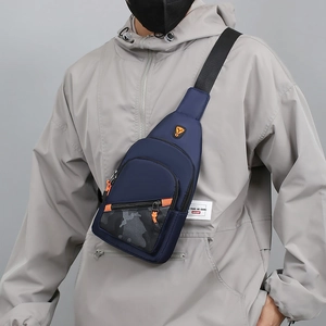Men's minimalist navy blue nylon chest bag with camouflage detail and orange zipper pulls