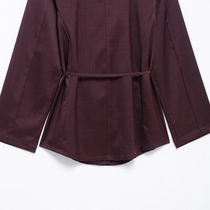 Deep purple satin blouse with lapel collar and waist tie belt for a professional look