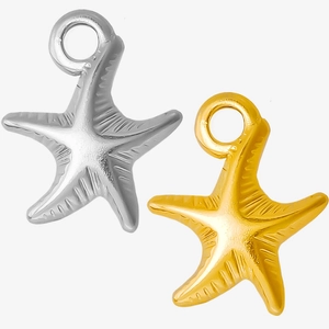Macro detail of 304 stainless steel starfish pendants in silver and gold metal finish