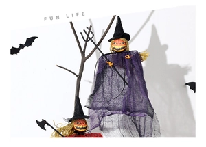 Detail of Halloween hanging ghost decor with pumpkin head, wizard hat and mesh cloak