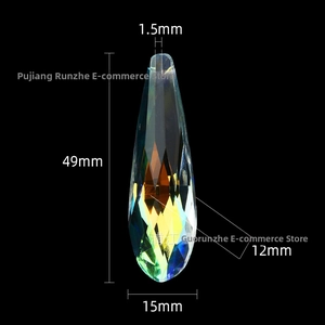 Macro shot of 49mm faceted crystal teardrop pendant with AB rainbow coating for suncatchers