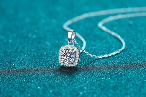 Macro shot of square halo pendant necklace with S925 silver finish and sparkling stones