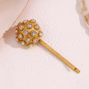 Detailed view of 18K gold plated hair clip featuring clear rhinestones on spherical head