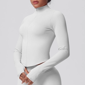 Detail view of high-elasticity light gray fitness jacket with stand collar and zipper