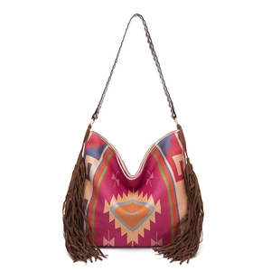 Detail of bohemian jacquard shoulder bag featuring ethnic patterns and brown side fringes