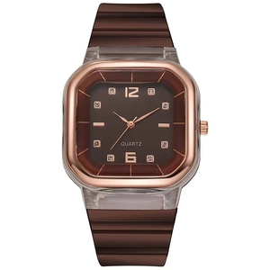 Close-up of square rose gold quartz watch featuring brown dial and rhinestone indices