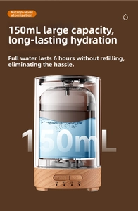 Detail view of 150ml USB humidifier with wood grain base and transparent water tank