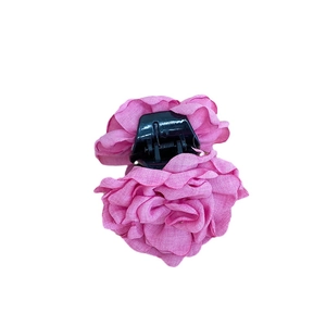 Elegant pink fabric rose hair claw clip with French vintage aesthetic for women