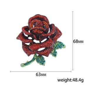 Luxurious red rose rhinestone brooch with green leaves and size dimensions, 68mm by 63mm