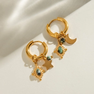 Gold celestial earrings with moon star charms and oval turquoise stones in stainless steel