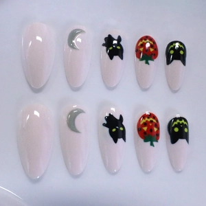 Hand-painted Halloween press-on nails with black cat and silver moon on almond shape