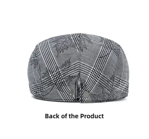 Detail of the back view showing the plaid maple leaf cap with a metal adjustable buckle