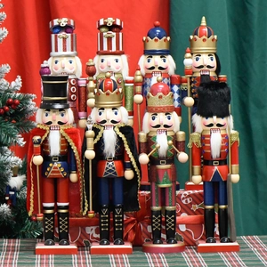 Traditional Christmas nutcracker wooden soldiers set in festive red and green background