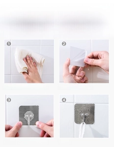 Step-by-step installation guide for heavy-duty adhesive wall hooks on tile surface