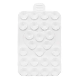 Detailed view of white heart-shaped silicone suction cup pad for mobile phones