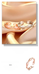 Macro detail of S925 engraved silver coffee bean chain rings in rose gold and white silver