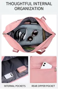 Close-up of internal layered pockets and back zipper pocket of a pink travel sports bag