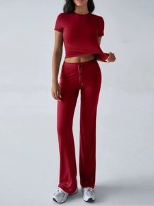 Deep red two-piece set featuring short-sleeve crew neck top and drawstring trousers